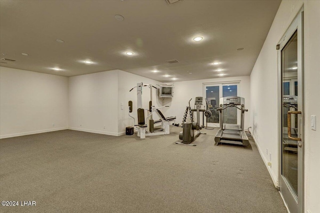 exercise room with carpet floors