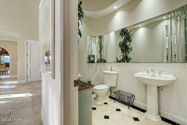 bathroom with sink and toilet