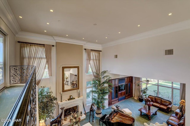 living room featuring crown molding and carpet floors