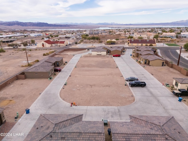 drone / aerial view featuring a mountain view