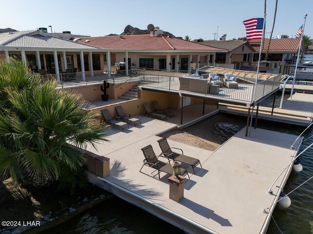 8858 Moovalya Dr, Parker, AZ 85344 - dock area featuring a patio and a water view