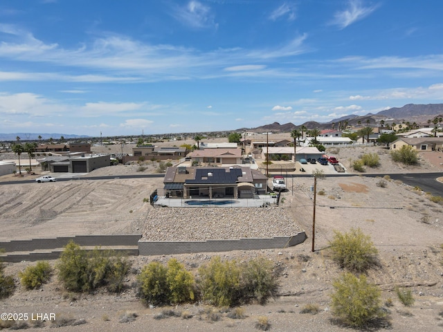 aerial view with a mountain view and a residential view