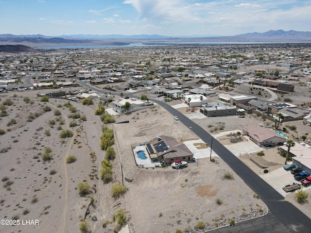 bird's eye view with a residential view and a mountain view