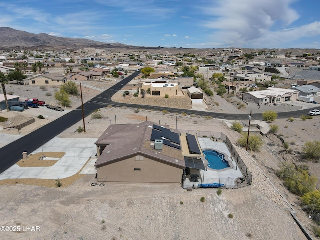 aerial view with a mountain view and a residential view