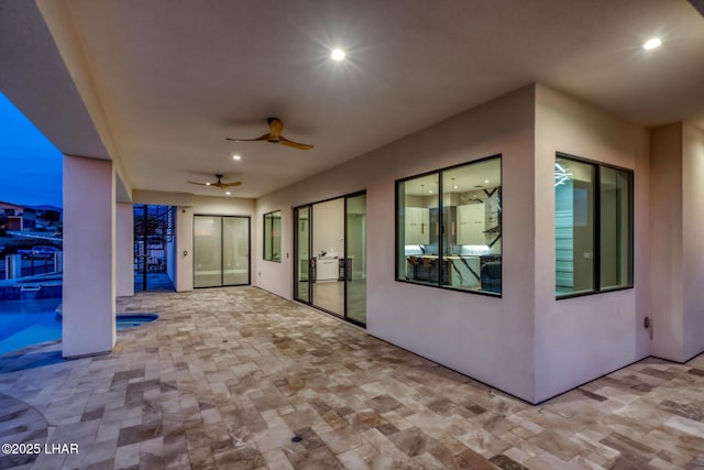 view of patio / terrace with ceiling fan