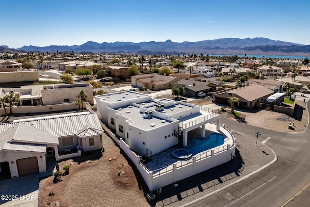 drone / aerial view featuring a mountain view