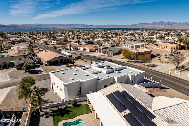 birds eye view of property featuring a mountain view