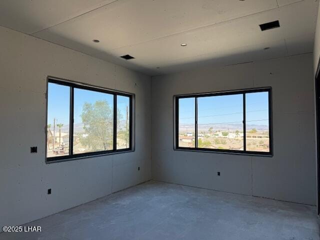 2931 Simitan Dr, Lake Havasu City, AZ 86404 - unfurnished room featuring plenty of natural light and concrete flooring