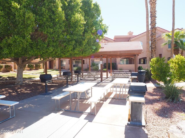 surrounding community featuring a patio area