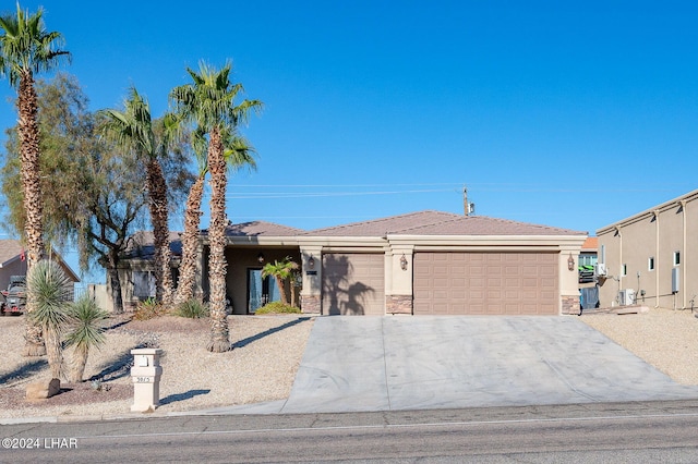 view of front of home with a garage