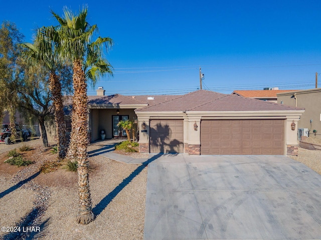 view of front of home with a garage