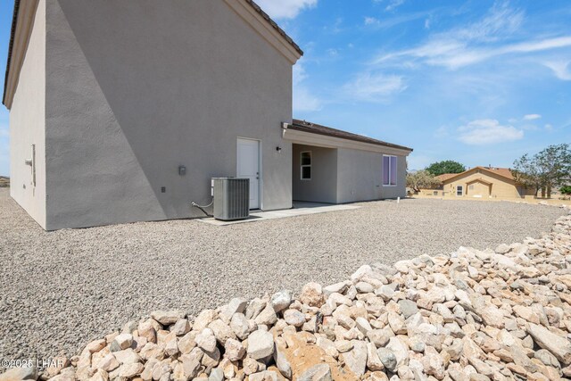 9342 N Broken Saddle Dr, Kingman, AZ 86401 - back of house featuring a patio and stucco siding