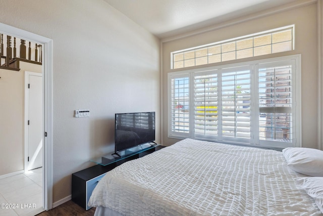 bedroom featuring baseboards