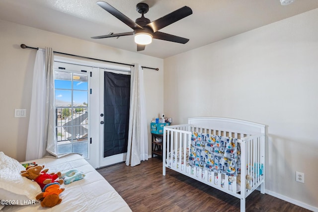 bedroom with french doors, dark wood-style flooring, a ceiling fan, and access to exterior