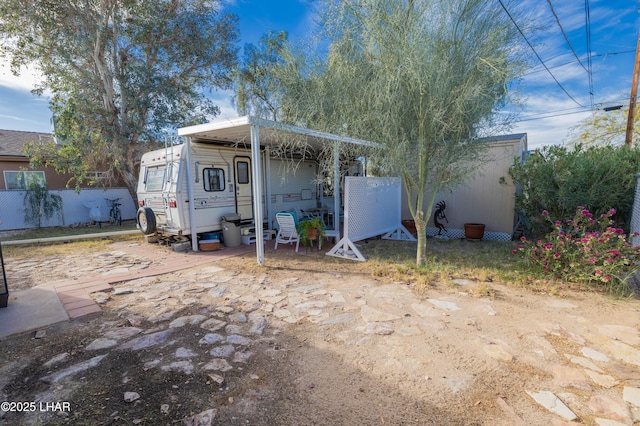 exterior space featuring fence