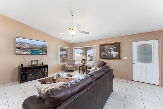 1607 Linda Dr, Lake Havasu City, AZ 86403 - living room with light tile patterned floors, ceiling fan, lofted ceiling, and baseboards