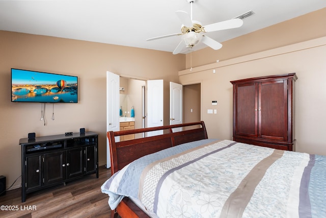 1607 Linda Dr, Lake Havasu City, AZ 86403 - bedroom with wood finished floors, lofted ceiling, and a ceiling fan