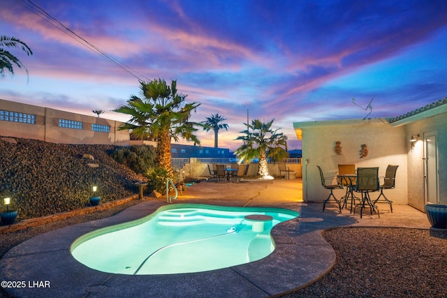 view of pool with a patio area, a fenced backyard, and a fenced in pool