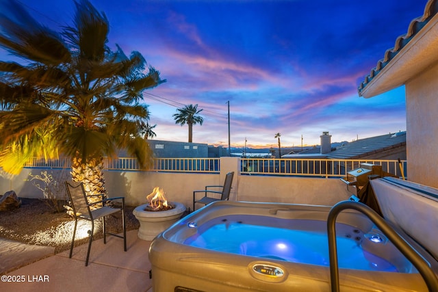 view of pool with an outdoor fire pit