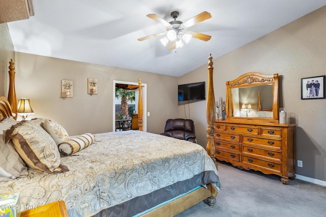 carpeted bedroom with lofted ceiling, a ceiling fan, and baseboards