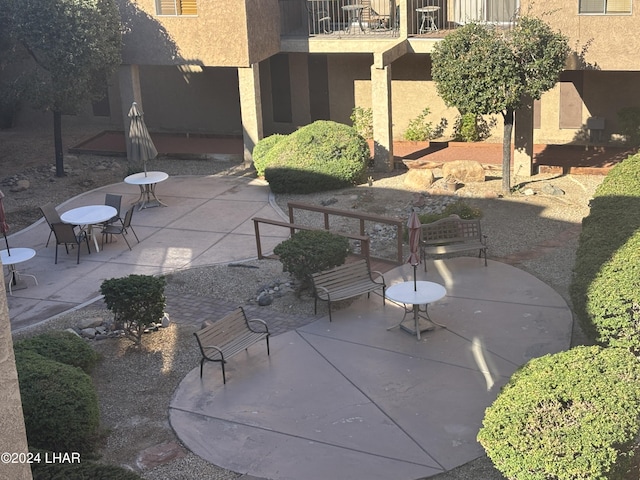 view of patio / terrace with a balcony