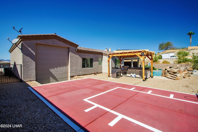 rear view of property featuring a pergola