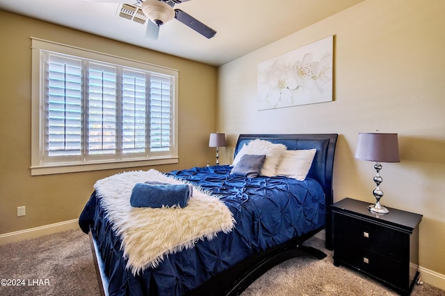 carpeted bedroom with ceiling fan