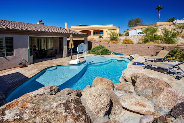 view of pool with a patio