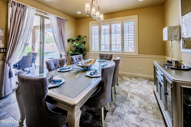 dining area with a chandelier