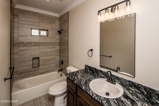 bathroom with vanity, crown molding, toilet, and  shower combination