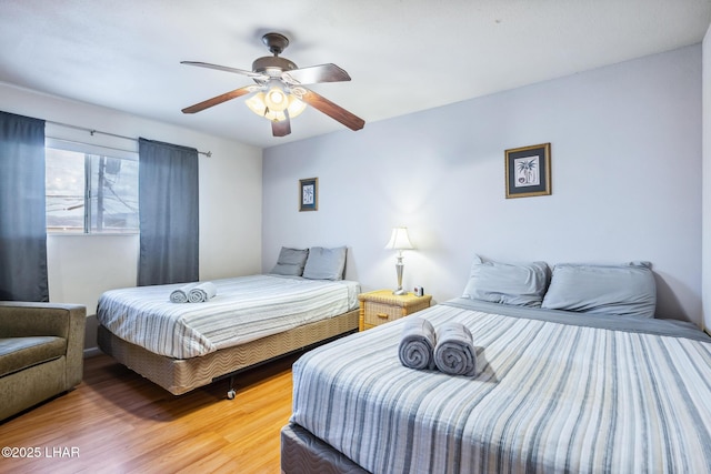 2100 Swanson Ave Unit 208, Lake Havasu City, AZ 86403 - bedroom featuring wood finished floors and a ceiling fan