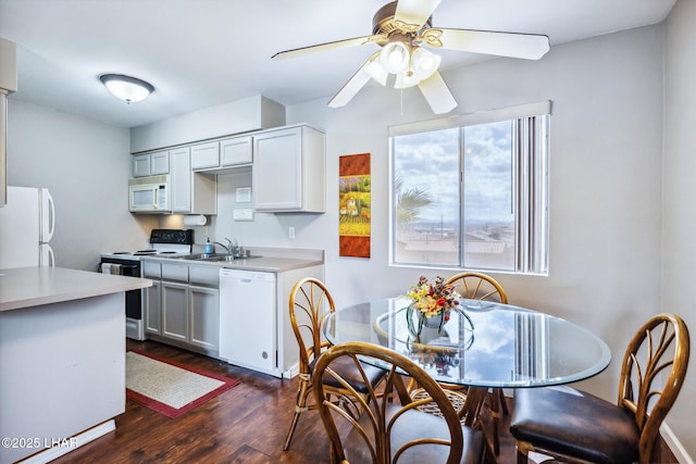 2100 Swanson Ave Unit 208, Lake Havasu City, AZ 86403 - kitchen featuring white appliances, dark wood-type flooring, ceiling fan, a sink, and light countertops