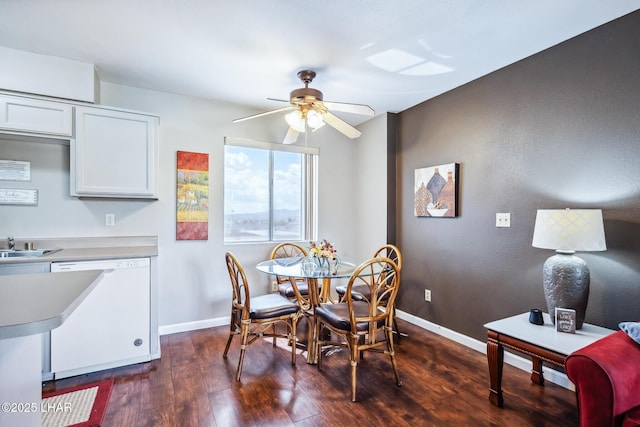2100 Swanson Ave Unit 208, Lake Havasu City, AZ 86403 - dining area featuring baseboards, dark wood finished floors, and ceiling fan