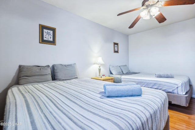 2100 Swanson Ave Unit 208, Lake Havasu City, AZ 86403 - bedroom with light wood-style floors and a ceiling fan