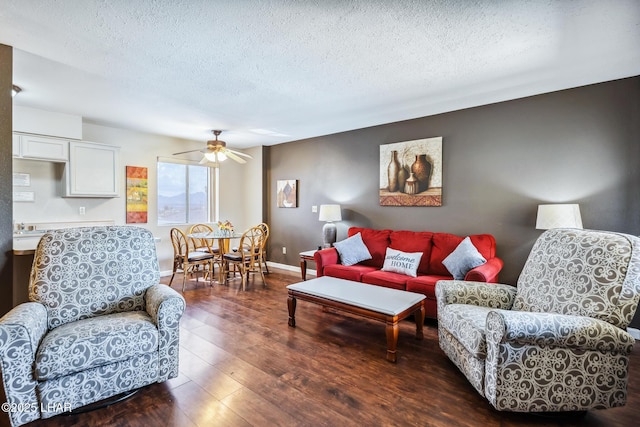 2100 Swanson Ave Unit 208, Lake Havasu City, AZ 86403 - living area with a textured ceiling, ceiling fan, hardwood / wood-style floors, and baseboards