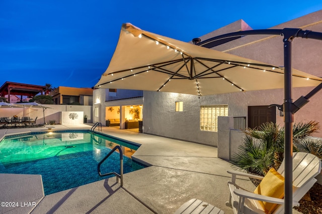 view of pool featuring a patio