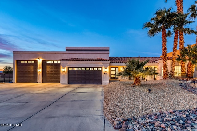 view of front of house with a garage