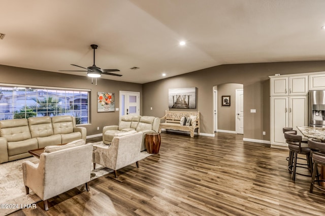 living room with vaulted ceiling, wood-type flooring, and ceiling fan