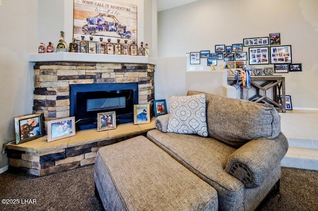 8839 Yaqui Loop, Parker, AZ 85344 - living room featuring carpet, a stone fireplace, and baseboards
