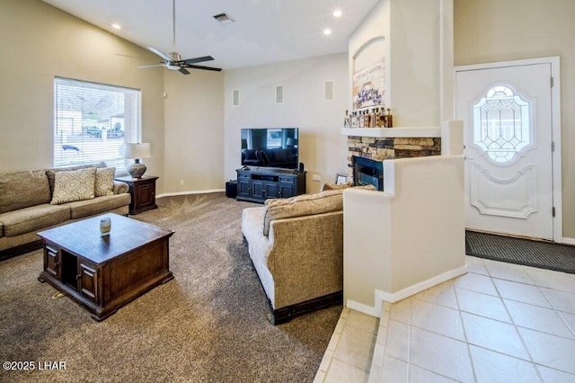 8839 Yaqui Loop, Parker, AZ 85344 - living area featuring recessed lighting, a ceiling fan, baseboards, light colored carpet, and a stone fireplace