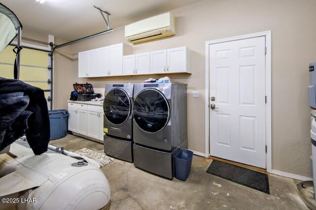 8839 Yaqui Loop, Parker, AZ 85344 - laundry area with washer and clothes dryer, a wall mounted AC, cabinet space, and baseboards