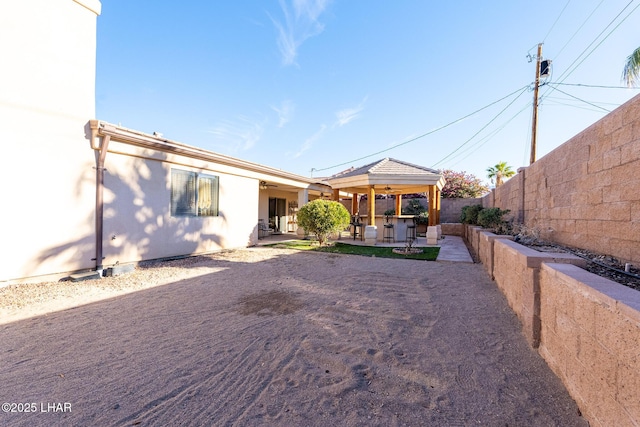 rear view of property with a patio