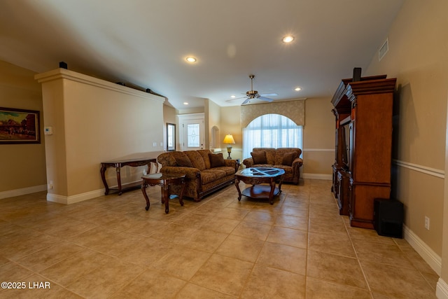 tiled living room featuring ceiling fan