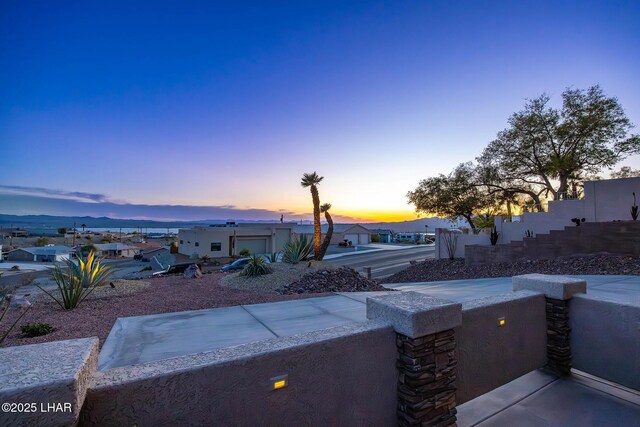 1216 Avalon Ave, Lake Havasu City, AZ 86404 - view of yard at dusk