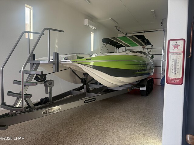 1216 Avalon Ave, Lake Havasu City, AZ 86404 - garage with a wall unit AC