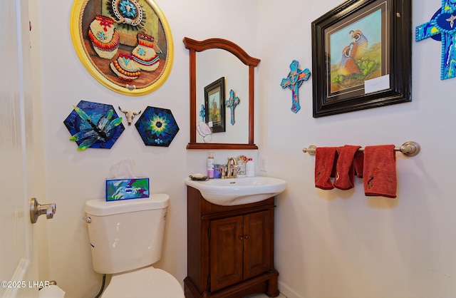 49605 Felspar Ave, Quartzsite, AZ 85346 - half bathroom featuring vanity and toilet