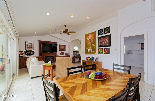 49605 Felspar Ave, Quartzsite, AZ 85346 - dining room with light tile patterned floors, vaulted ceiling, a ceiling fan, recessed lighting, and arched walkways