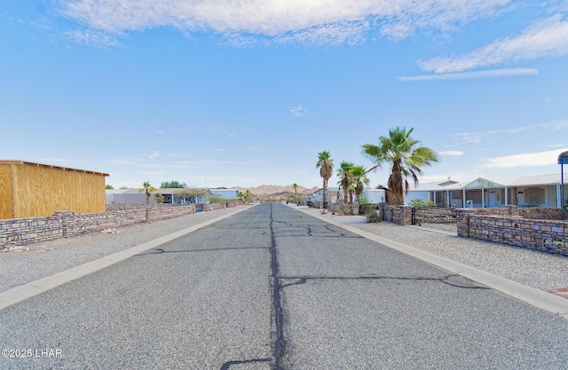 49605 Felspar Ave, Quartzsite, AZ 85346 - view of asphalt street featuring a residential view