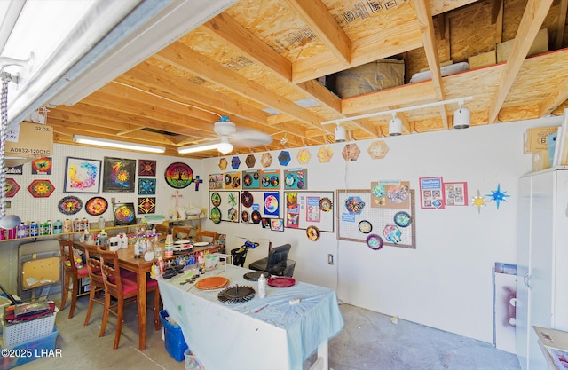 49605 Felspar Ave, Quartzsite, AZ 85346 - rec room featuring unfinished concrete flooring and a ceiling fan