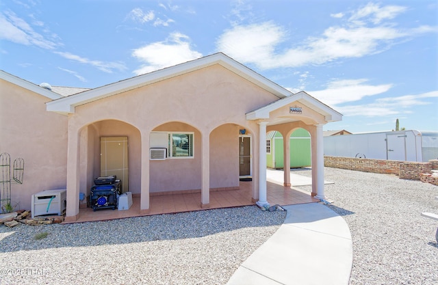 49605 Felspar Ave, Quartzsite, AZ 85346 - property entrance featuring stucco siding